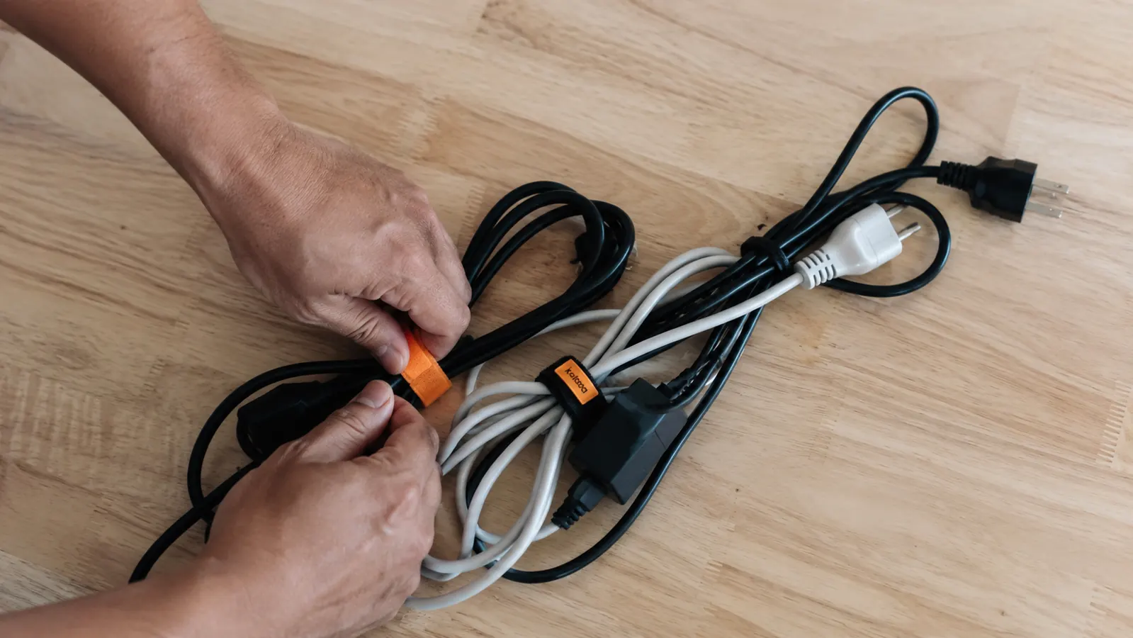 Velcro cable ties bundling a group of cords together neatly